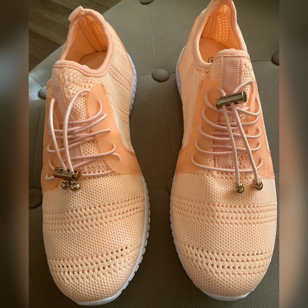 Never worn light orange sneakers
